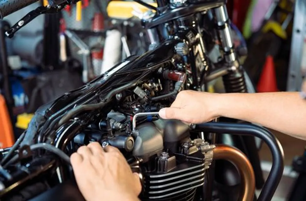 Hands-on engine work at the RR Bike Repairs workshop